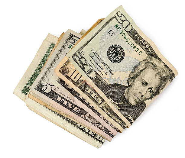 istock Wad Of Money With Shadow On White 593336534