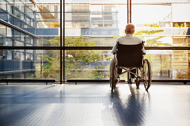 istock Senior Man in Wheelchair 593338884