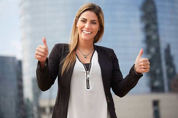 Business woman shows that everything is OK