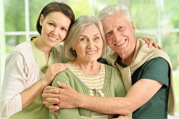 istock Happy senior parents with daughter 594012708