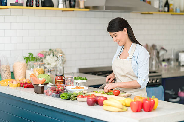 istock Latin woman in the kitchen 594013366