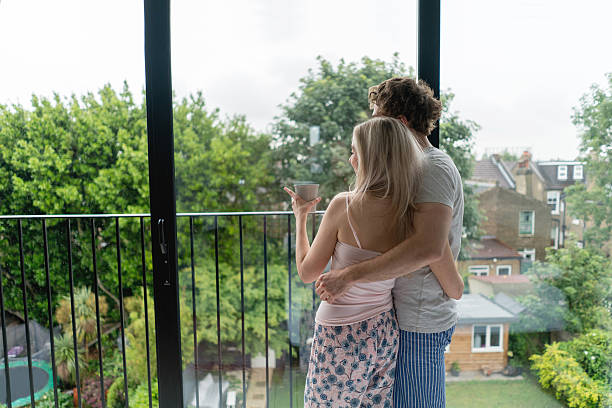 istock Loving couple drinking coffee at home 594015760