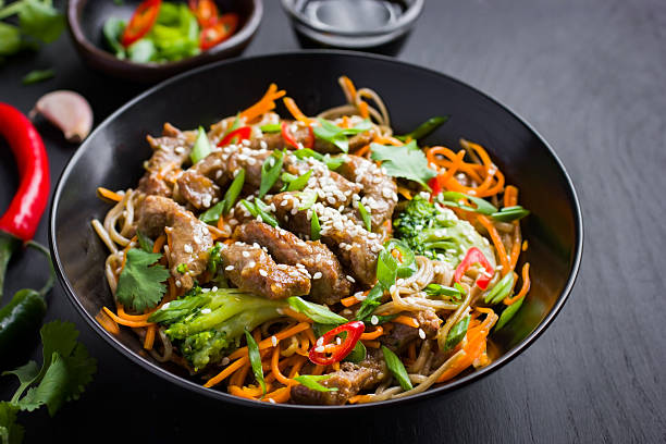 Bowl of soba noodles with beef and vegetables. Asian food. stock photo