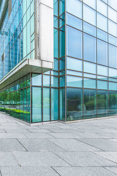 istock empty pavement and modern buildings in city 594017028