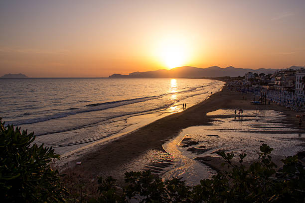 istock sunset on the beach of Sperlonga, Italy 594017120