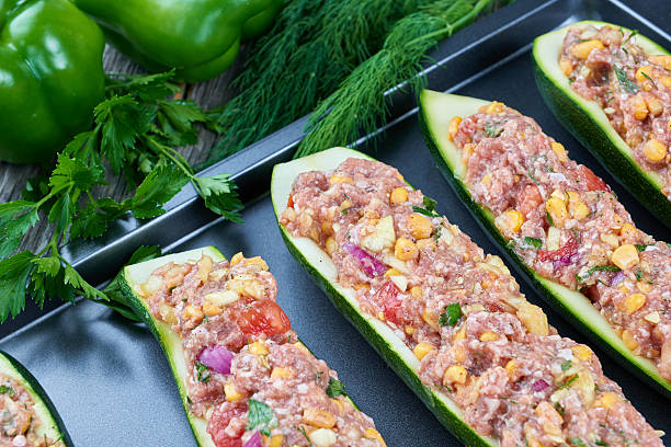istock Raw courgettes stuffed with meat and vegetables 594017634