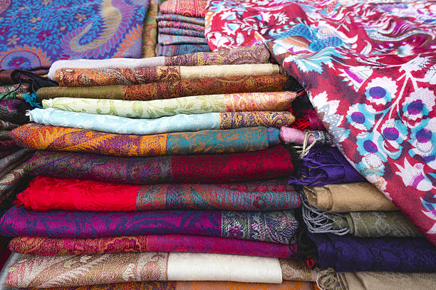 istock Selling cloth shawls on a market in eastern Indonesia 594021784
