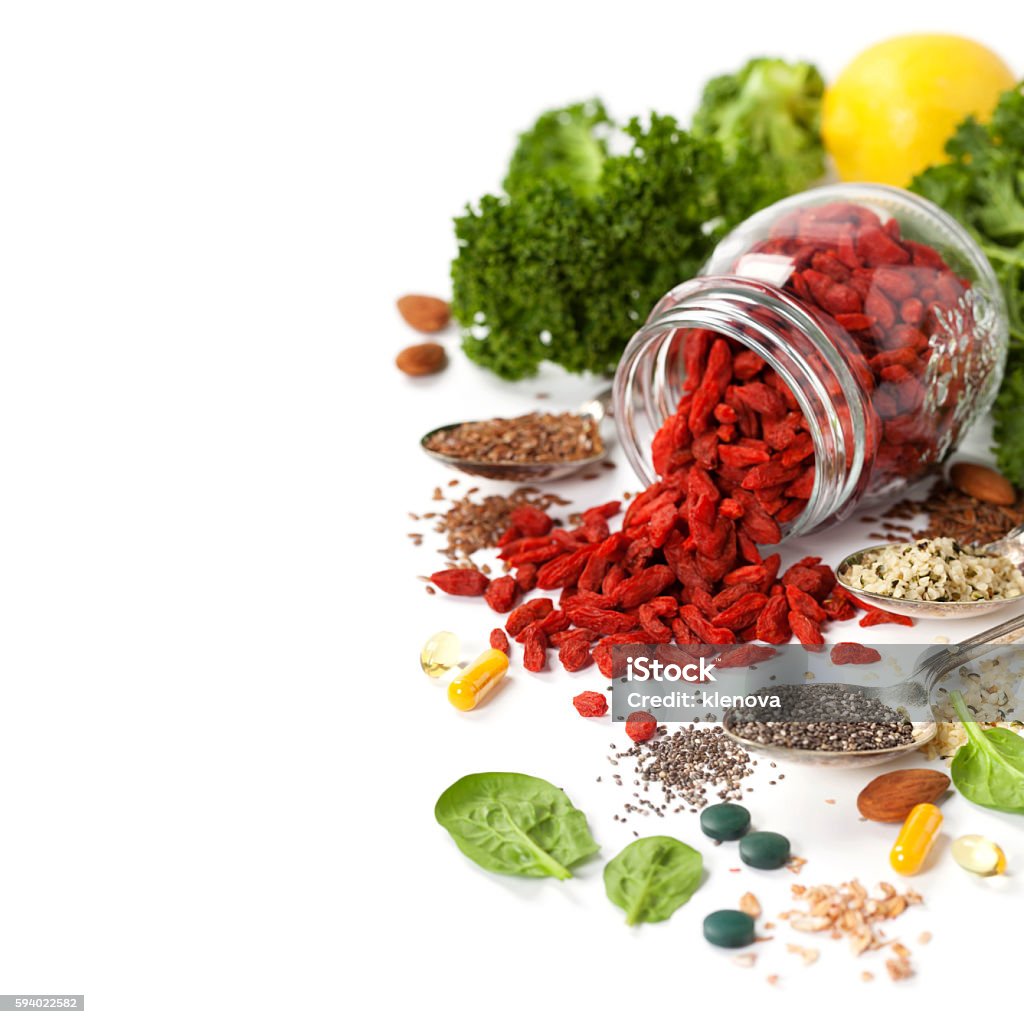 Various superfoods on white background Various superfoods on white background. Healthy food, diet, vegetarian or clean eating concept. Antioxidant Stock Photo