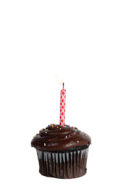 istock Birthday cupcake with red candle 594026184