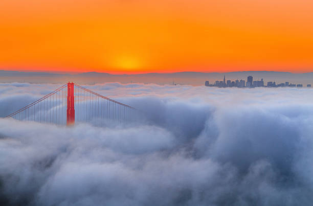 istock Golden Gate Bridge and Low Fog at sunrise 594026812