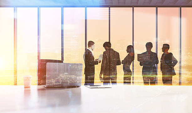 istock Businesspeople silhouettes, teamwork concept 594028960