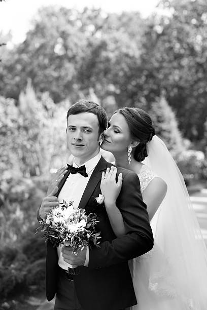 istock Funny couple on e-session. Preparing for wedding potography. 594029506