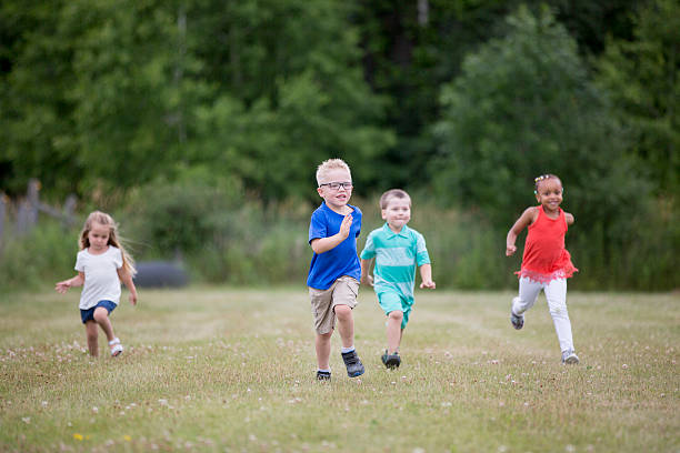 istock Preschool Children Running Outside 594030092
