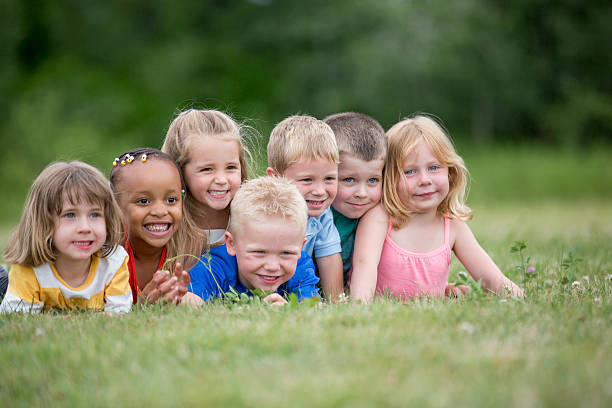 istock Preschool Children Lying in a Group 594030154