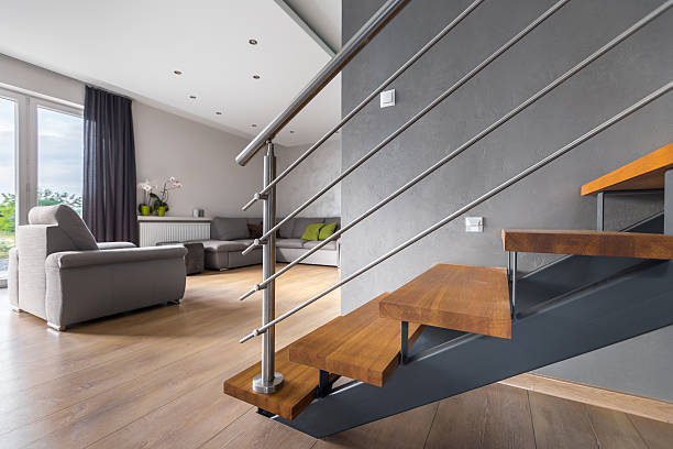 Open plan living room with staircase New design light open living room with balcony and wooden staircase house railing stock pictures, royalty-free photos & images