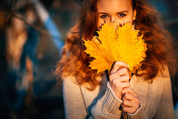 istock beautiful girl on a background autumn forest 594032438