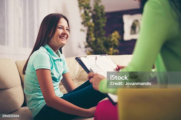 Girl Teenager Is Happy After A Successful Therapy By Psychologists Stock Photo - Download Image Now