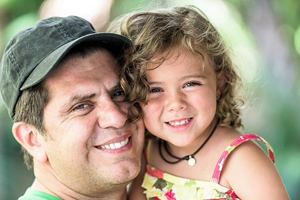 istock Father and daughter playing together 594034054