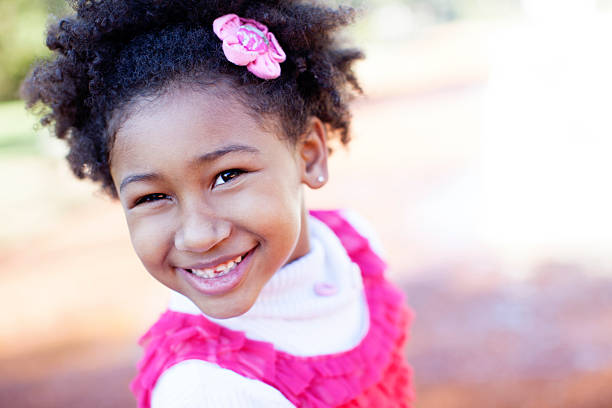 istock African American Girl Looking at Camera 594036894