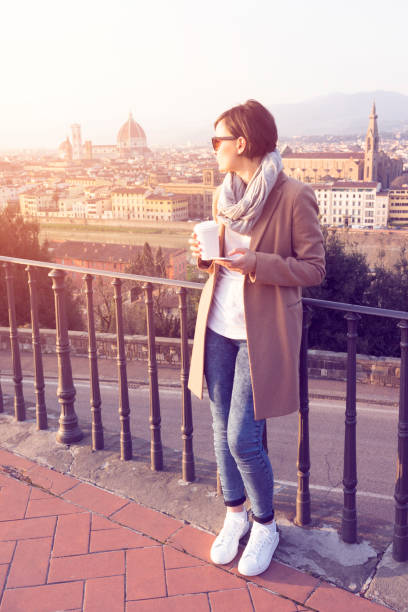 istock Young woman using smartphone in the city 594042914