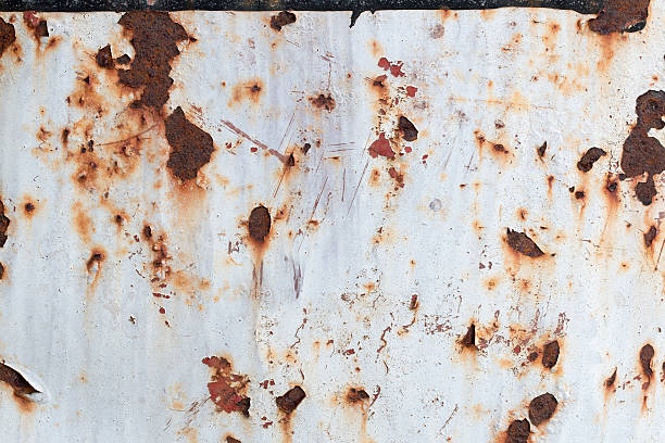istock background of peeling paint and rusty old metal 594049762