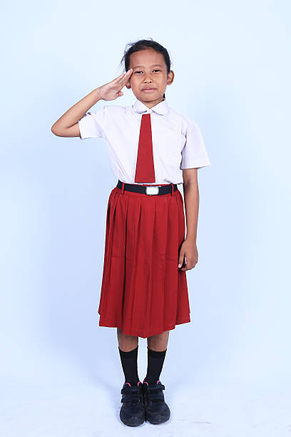 小学生 - child military saluting flag ストックフォトと画像