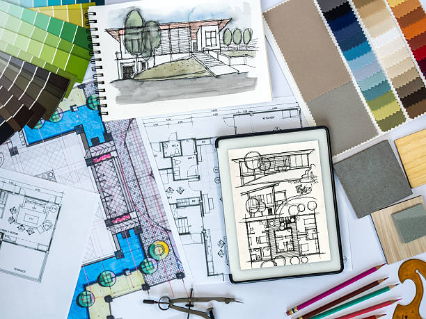 Architect, interior designer worktable with tablet computer & sketch stock photo