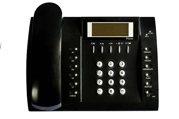 istock Old Black office telephone isolated on white background 594056122