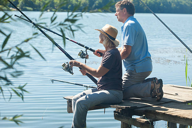 istock Couple fishing together 594057264