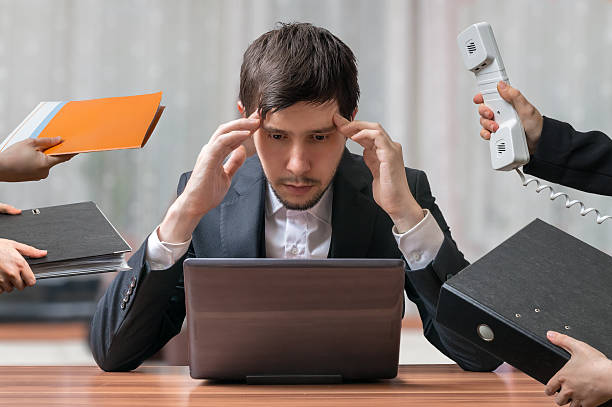 istock Thinking busy businessman is working with laptop. Team work concept. 594057484