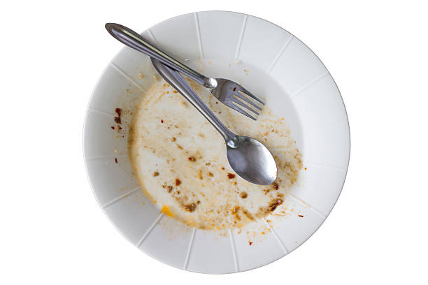 istock Rice dishes after eating isolated white background. 594058130