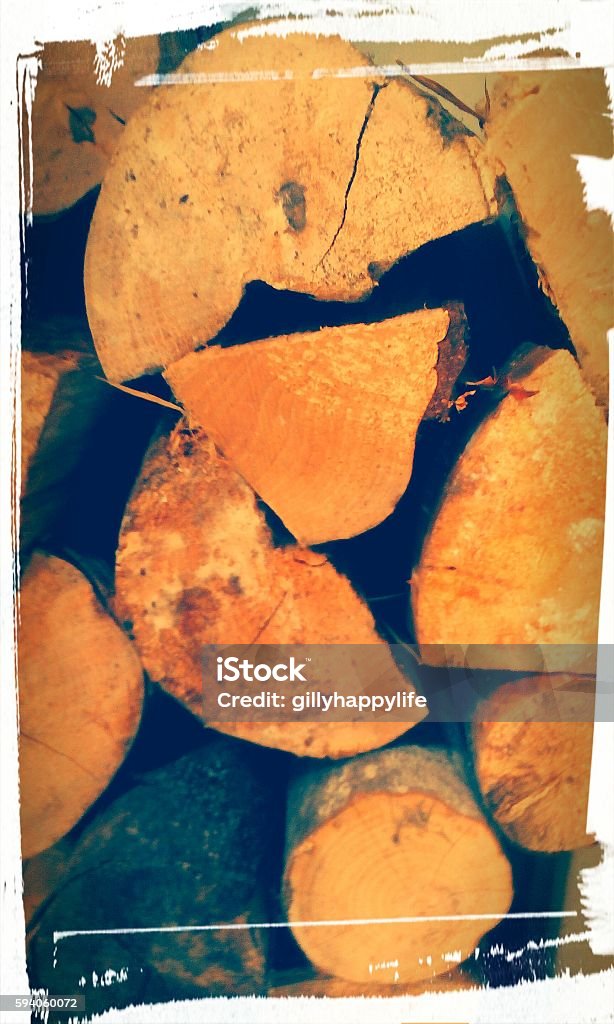 Warm,cosy autumn ,winter,log pile Small logs ready for the wood burner. Autumn Stock Photo