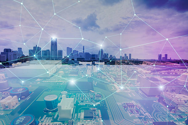istock fusion of modern cityscape and electric circuit board 594063374