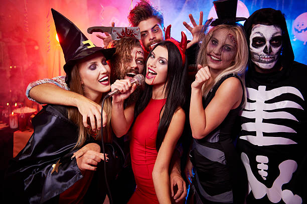 istock Friends singing together at the party 594063862
