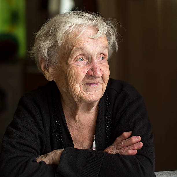 istock Elderly woman, closeup portrait. 594064362