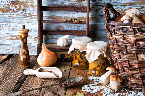 istock Fresh boletus in wicker basket in old rustic kitchen 594070256