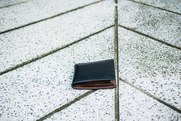istock Lost wallet on the street 594074772