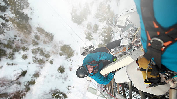istock Telecommunication manual high worker engineer climbing an antenna 594075924