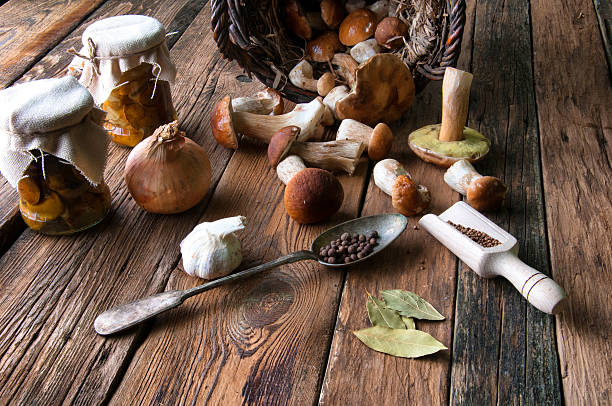 istock Fresh boletus in wicker basket in old rustic kitchen 594076540