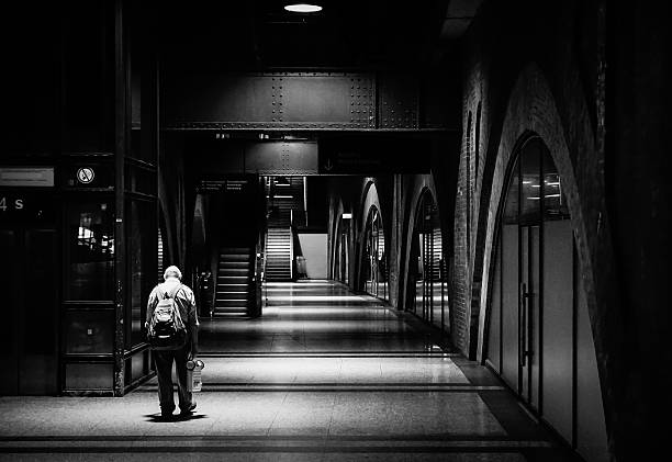 istock Rear View Of Man Walking At Subway Station 594397249