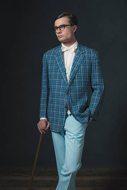 istock Retro 1920s fashion man wearing blue checkered jacket. 594445088