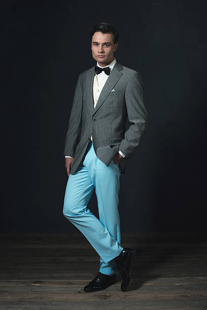 istock Retro 1920s fashion man wearing bow tie. 594446032