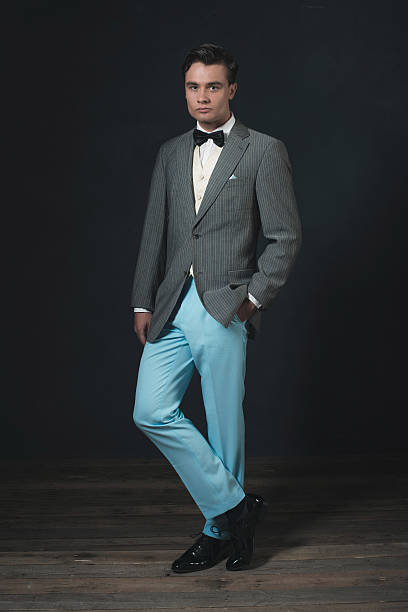istock Retro 1920s fashion man wearing bow tie. 594446056