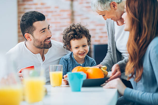 istock Grandmother serving fruits 594447372