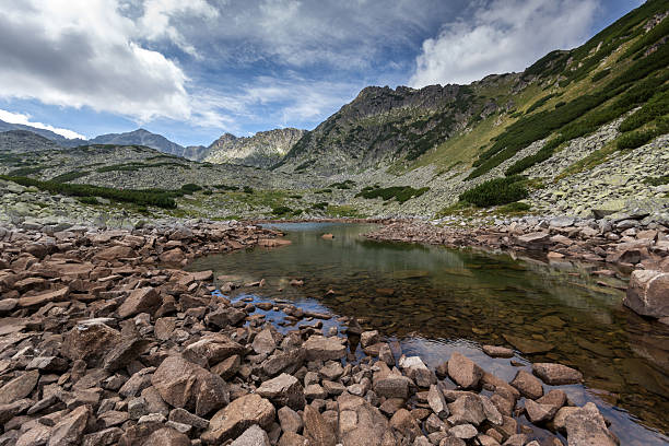istock Clouds over Musala peak and  Musalenski lakes,  Rila mountain 594448096