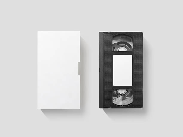 Blank white video cassette tape mockup, top view, clipping path Blank white video cassette tape mockup, isolated, top view, clipping path. Clear vhs cassete case design mock up. Retro tv videotape cover template. Analog movie casette box copy with sticker vcr photos stock pictures, royalty-free photos & images