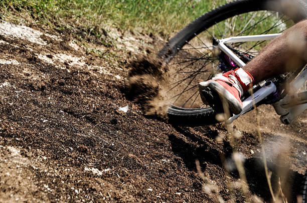 istock Bicycle tyre sliding across dust skid skidding 594449954