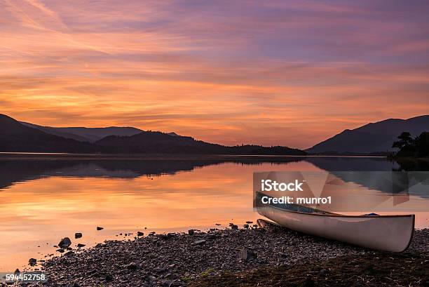 Canoe Sunset Stock Photo - Download Image Now - Derwent Water, Sunset, Canoe