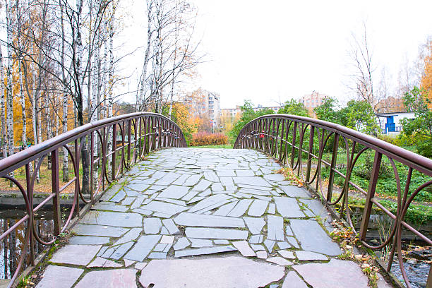 istock Old bridge in autumn, Petrozavodsk, Karelia 594453396