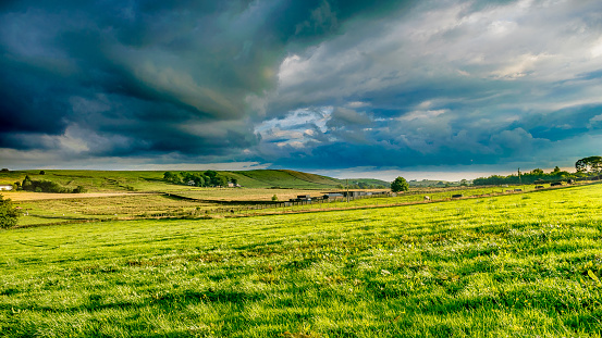 Sunny And Cloudy Countryside.